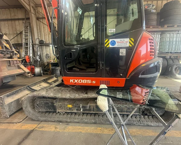 Windscreen replacement on a Kubota excavator by AWG Windscreens