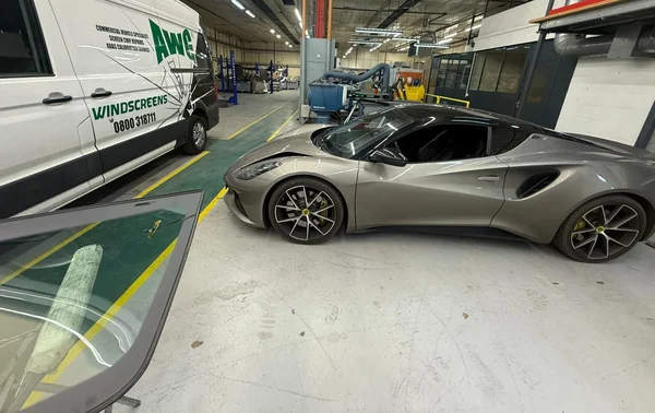 Glass remove and refit work in the AWG workshop