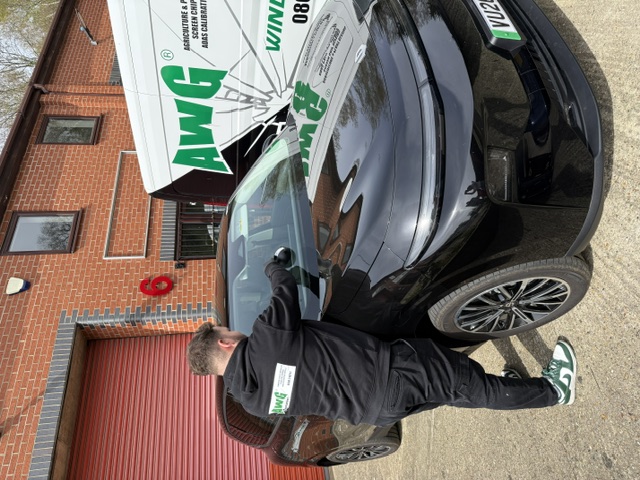 AWG Windscreens technician carrying out a windscreen chip repair